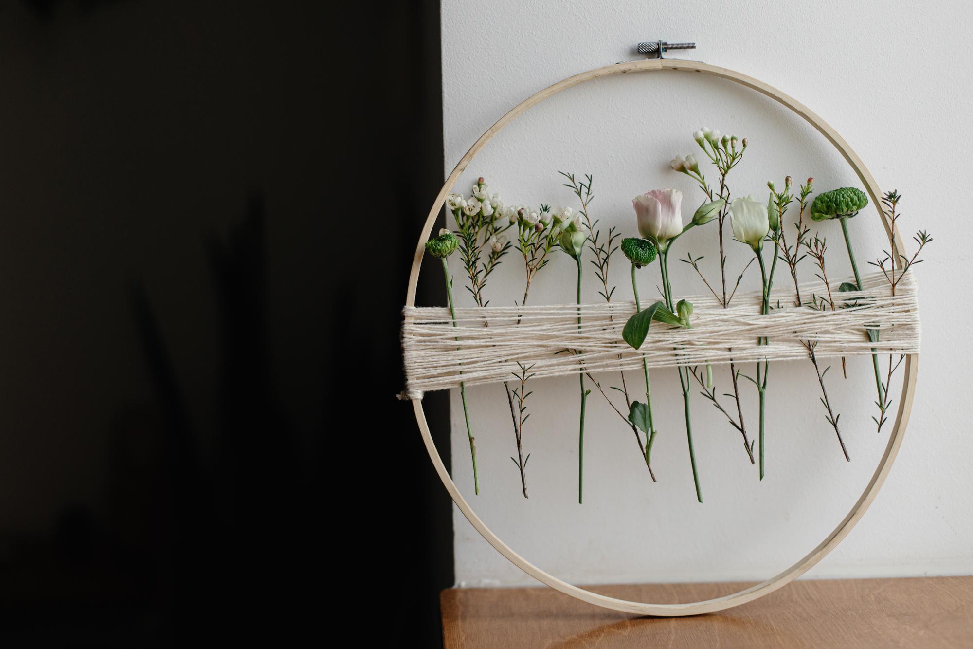 Framed embroidery of botanical motif